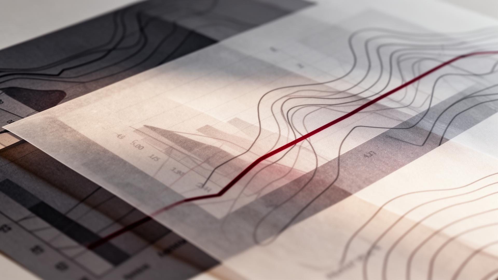 Layered analytical documents with a deep red trend line marking a key claims performance indicator